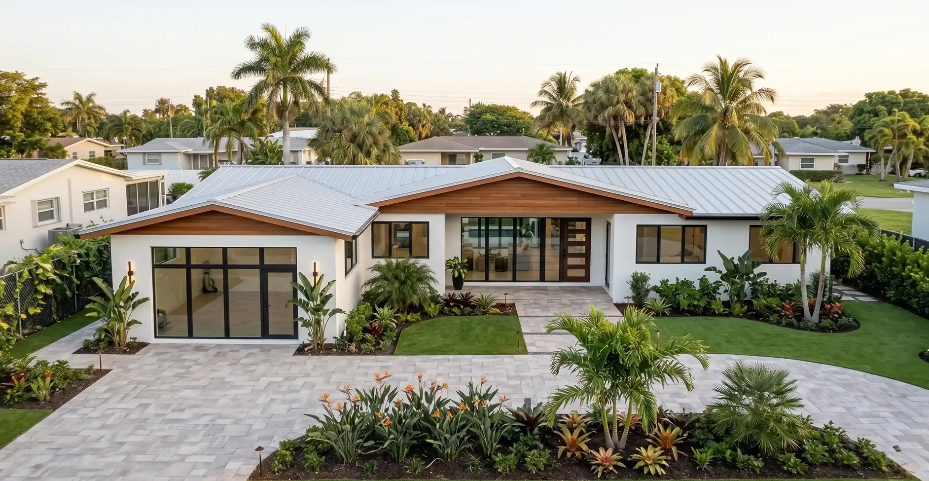 Panoramic view of a luxury whole home renovation and custom landscaping design in Florida.